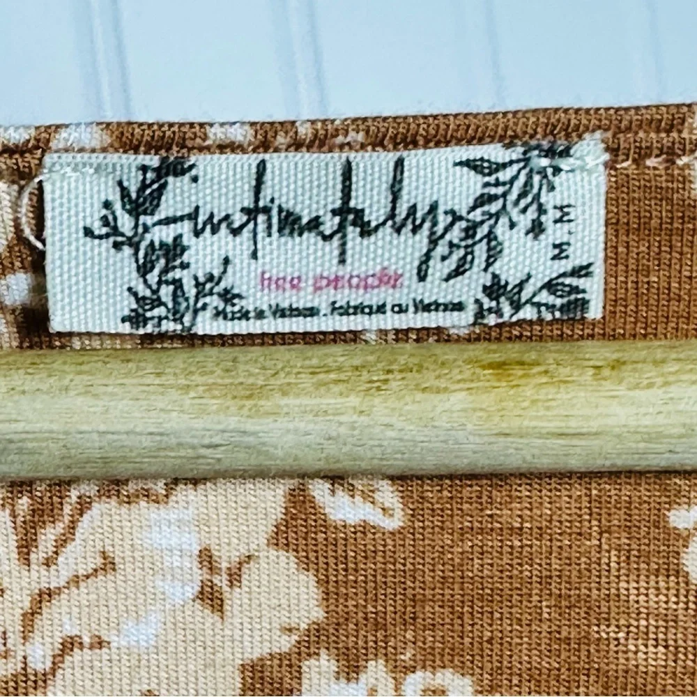 FREE PEOPLE Turnt Surplice Bodysuit in a copper floral print Medium NWT - Picture 9 of 11